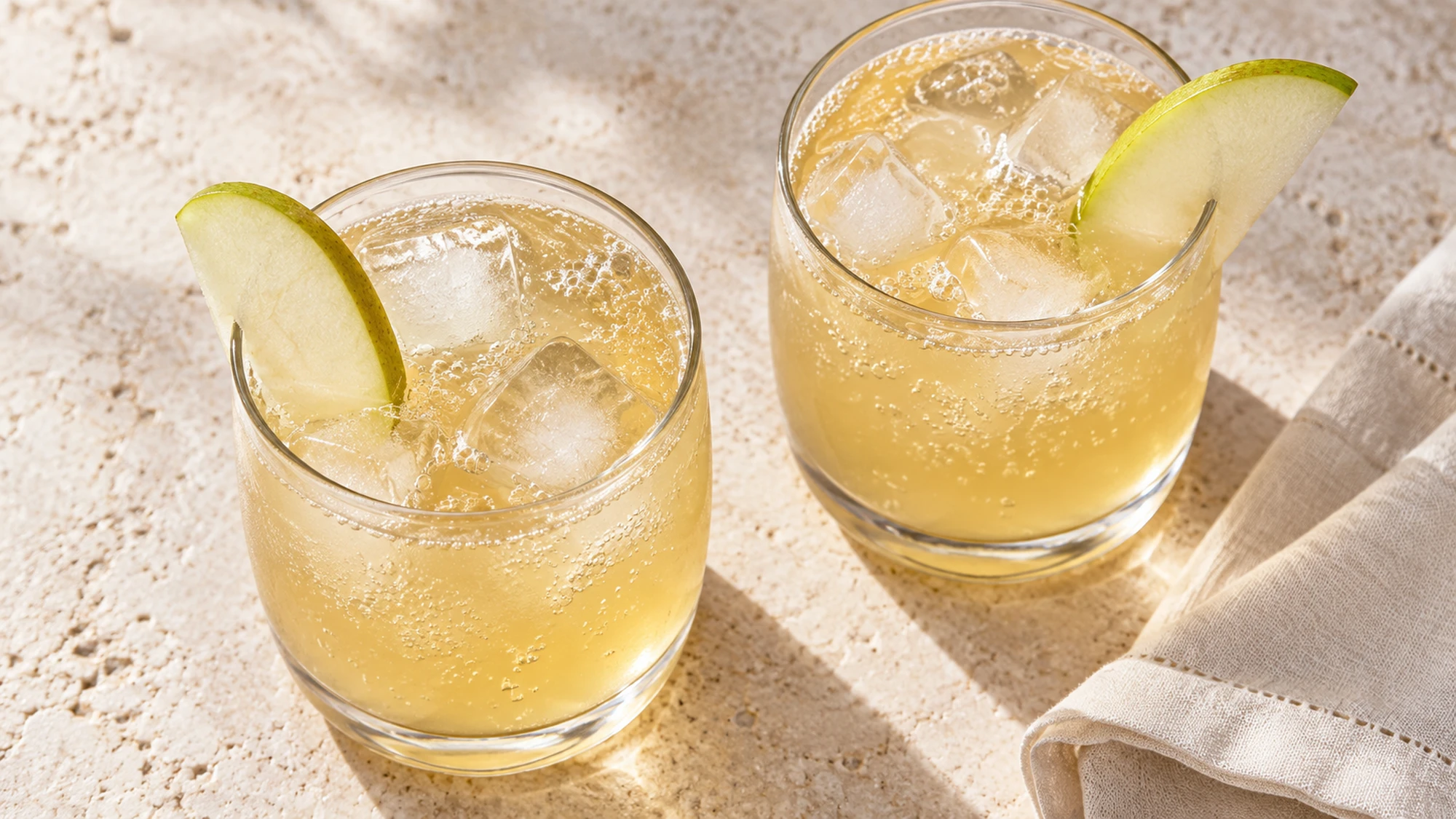 Two glasses of pear ginger mocktail viewed from above